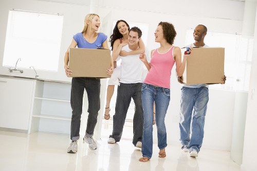 House movers loading a family home in Lee