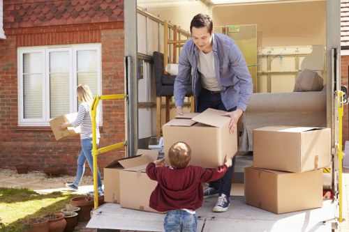 Man with van removal service helping a local move in Lee