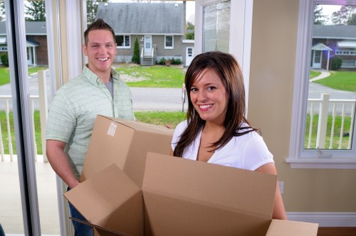 Moving van with recyclable boxes and furniture ready for reuse