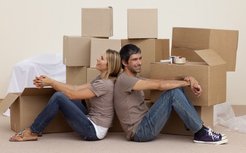 Packed boxes and furniture ready for man and van removals in Lee