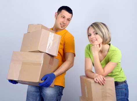 Commercial movers handling desks and office equipment in Lee