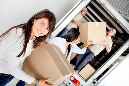 Furniture wrapping and loading during a house removal